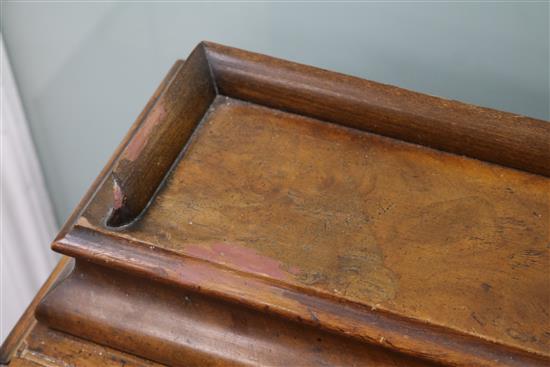 A late Victorian walnut davenport W.56cm